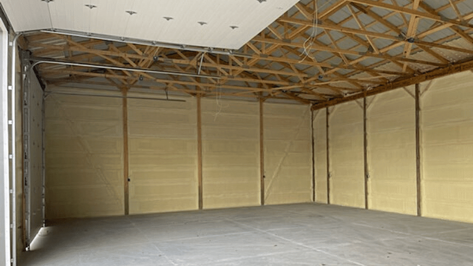 A pole barn that has been sprayed with polyurethane spray foam insulation.
